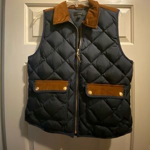 I. Crew quilted navy vest with brown accents size medium.
